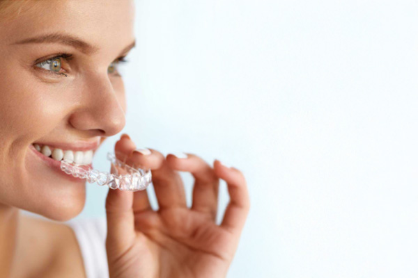 F-ONE Aligners - Person smiling with clear aligners